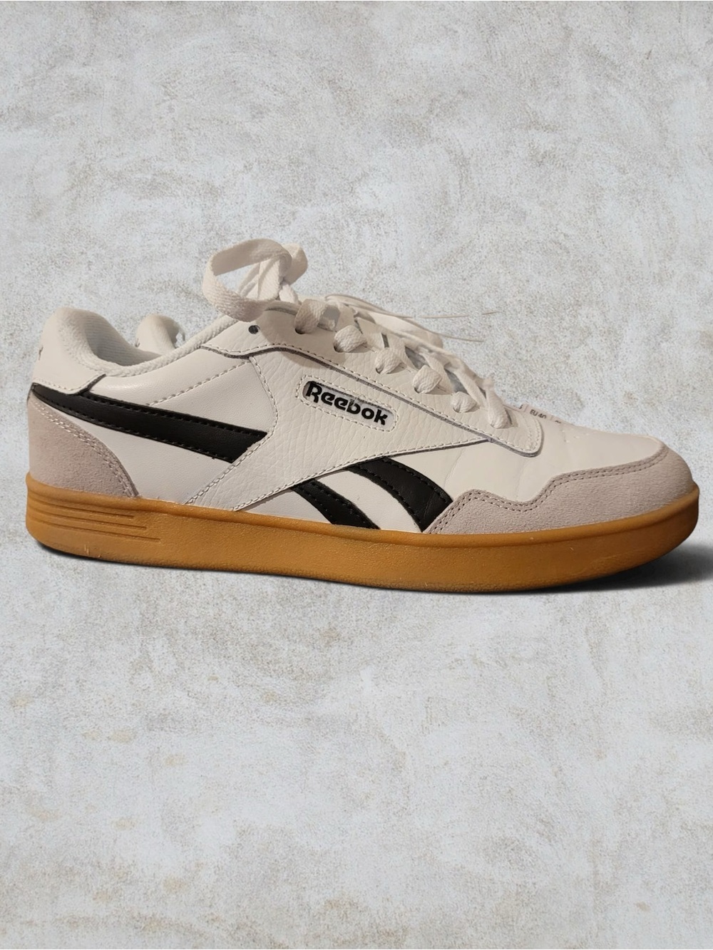 Reebok Royal Complete 2.0. Off-White Sneakers with Black Accents and Gum Sole